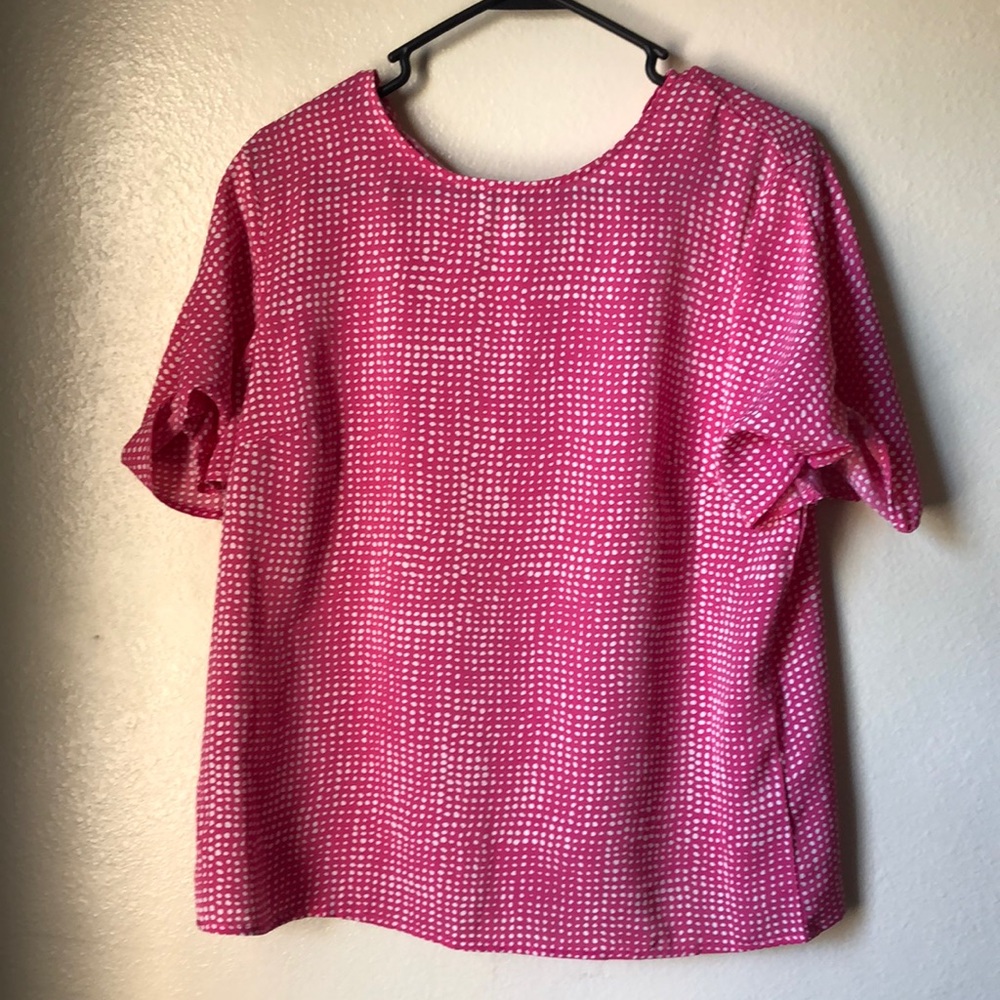 Pink and white polka dot blouse